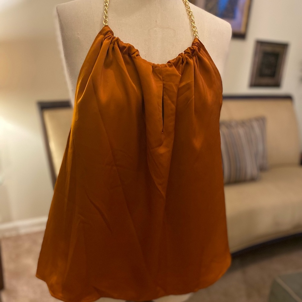 Women’s Open-Back blouse.